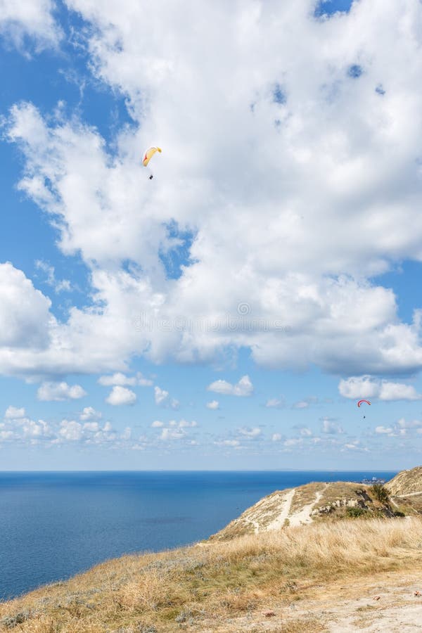 Beautiful landscape of high coast, blue sea and fluffy clouds on a sunny summer day. The Black Sea coast. Anapa. Beautiful landscape of high coast, blue sea and fluffy clouds on a sunny summer day. The Black Sea coast. Anapa.