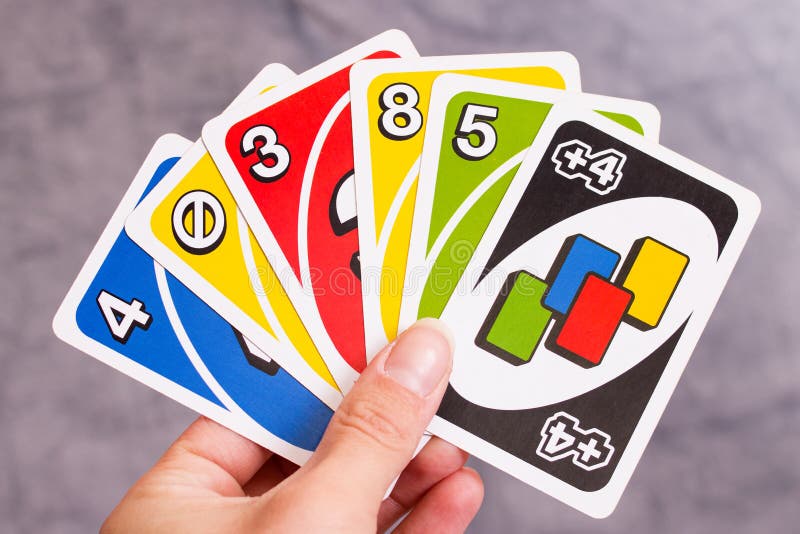 Uno cards in hand, card game Stock Photo by ©Egor_1896 239236398