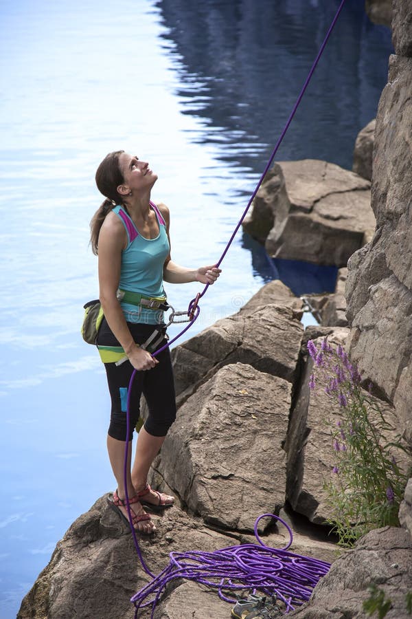 Belaying female climber