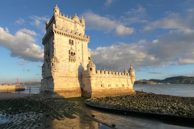 Torre de Belem (Belem Tower) on the Tagus River guarding the entrance to Lisbon in Portugal. This tower is among the most famous and easily recongnisable buildings in Portugal. Torre de Belem (Belem Tower) on the Tagus River guarding the entrance to Lisbon in Portugal. This tower is among the most famous and easily recongnisable buildings in Portugal.