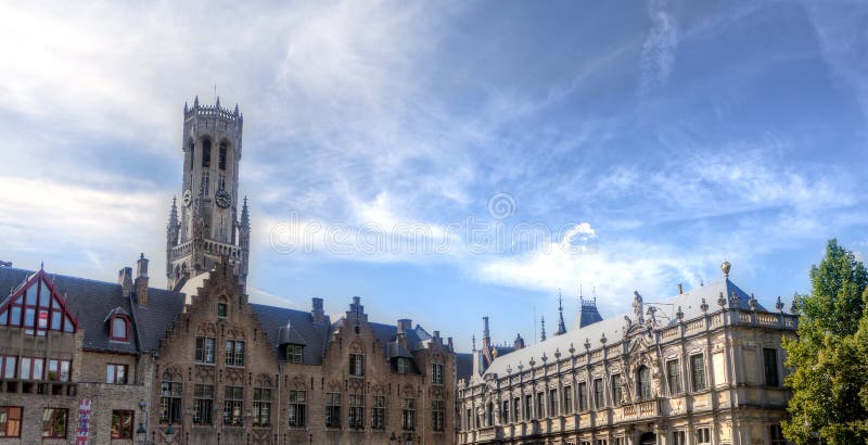 Market square with the belfry &#x28;belfort&#x29;, and medieval houses the in the old town of Bruges, Brugge, in Flanders, Belgium. Market square with the belfry &#x28;belfort&#x29;, and medieval houses the in the old town of Bruges, Brugge, in Flanders, Belgium.