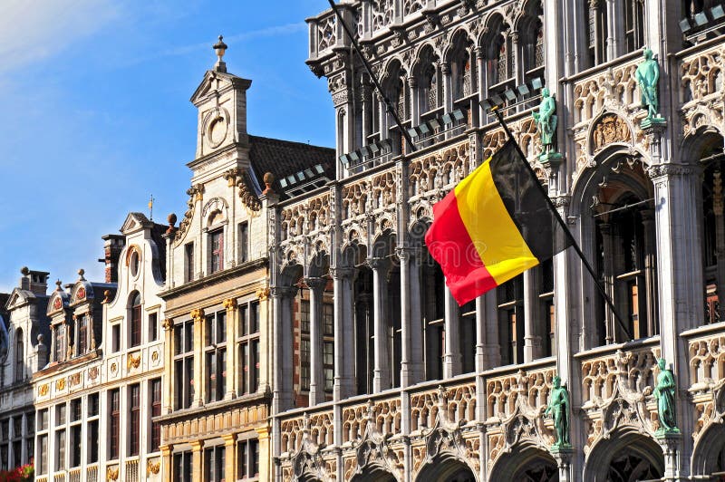 Belgian flag on the Grand Place Broodhuis in Brussels, Belgium.