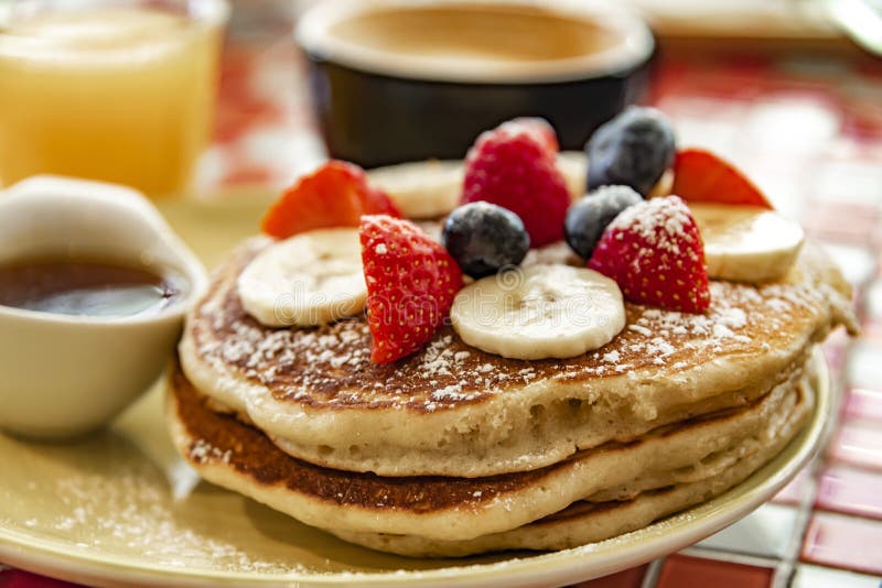 Belgian Pancakes Served with Fruits and Maple Syrup Stock Photo Image