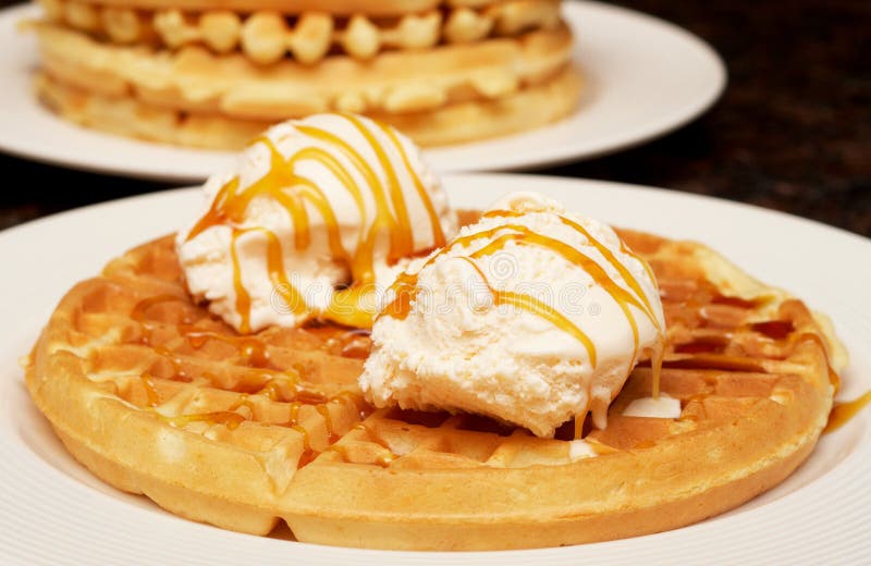 Belgian waffles with ice-cream and syrup
