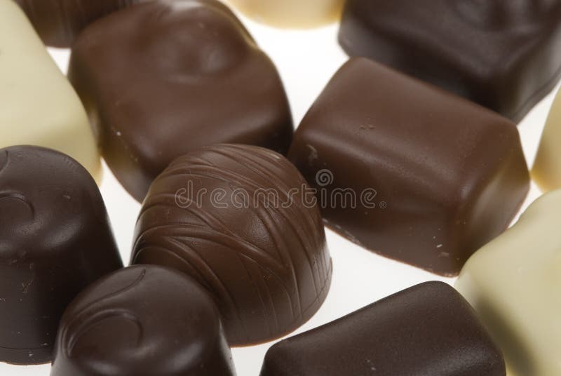 Lots of belgian pralines isolated on a white background. Lots of belgian pralines isolated on a white background