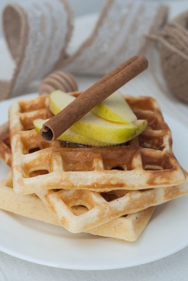 Belgium Square Waffles with Apples and cinnamon and honney. Close up Breakfast. homemade Food. Vertical Image.