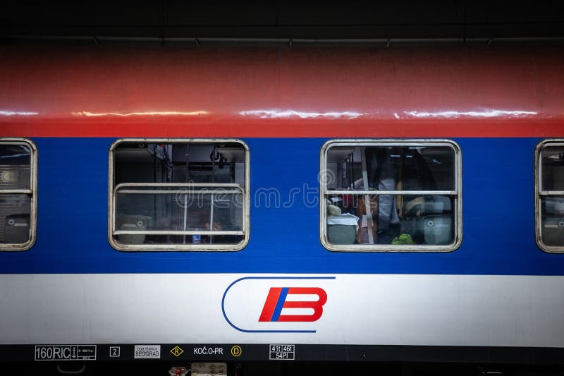 BELGRADE, SERBIA - MARCH 20, 2022: Logo of Srbija Voz, the serbian railways company, on a couchette sleeper car wagon ready for an