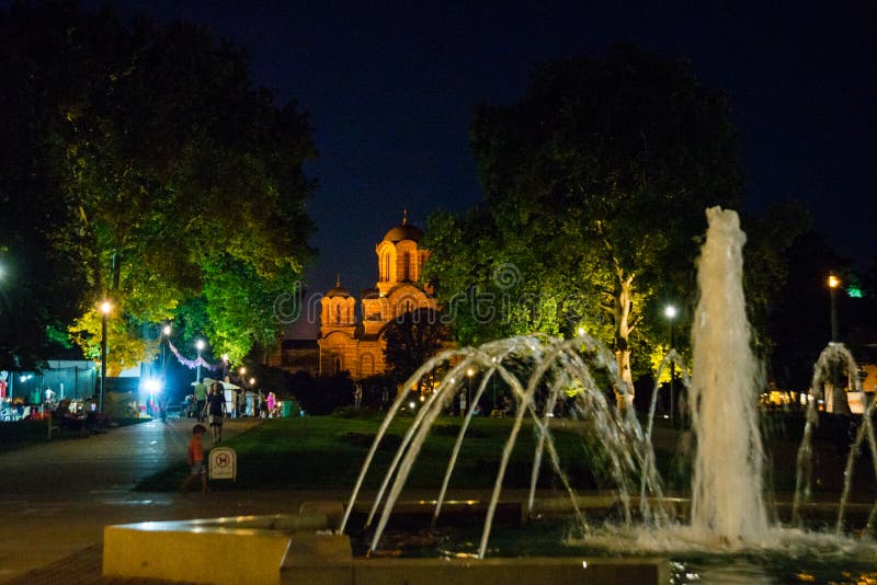 Belgrade, Serbia: St. Mark`s Church in the background, Tasmajdan Park. Night landscape with fountain