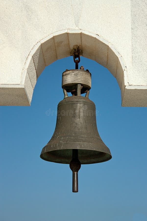 Church bell on blue sky background