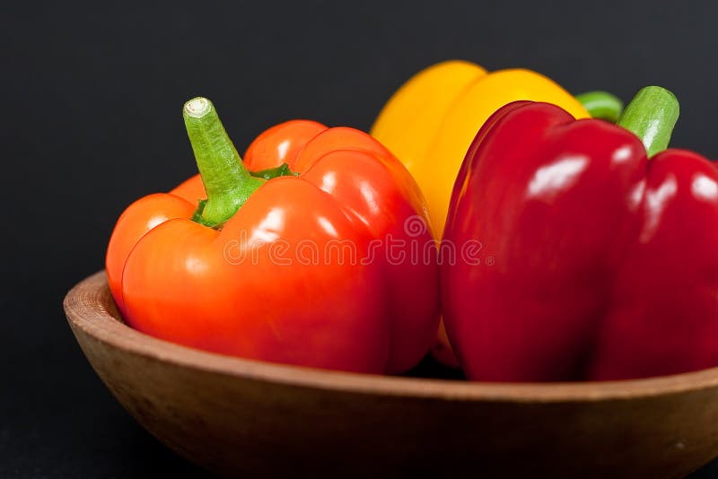 Bell Peppers in Wood Bowl