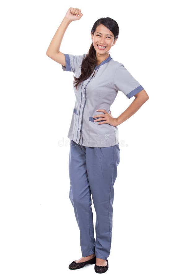 Bella domestica asiatica in uniforme molto emozionante immagine stock libera da diritti Bella domestica asiatica in uniforme molto emozionante immagine stock libera da diritti