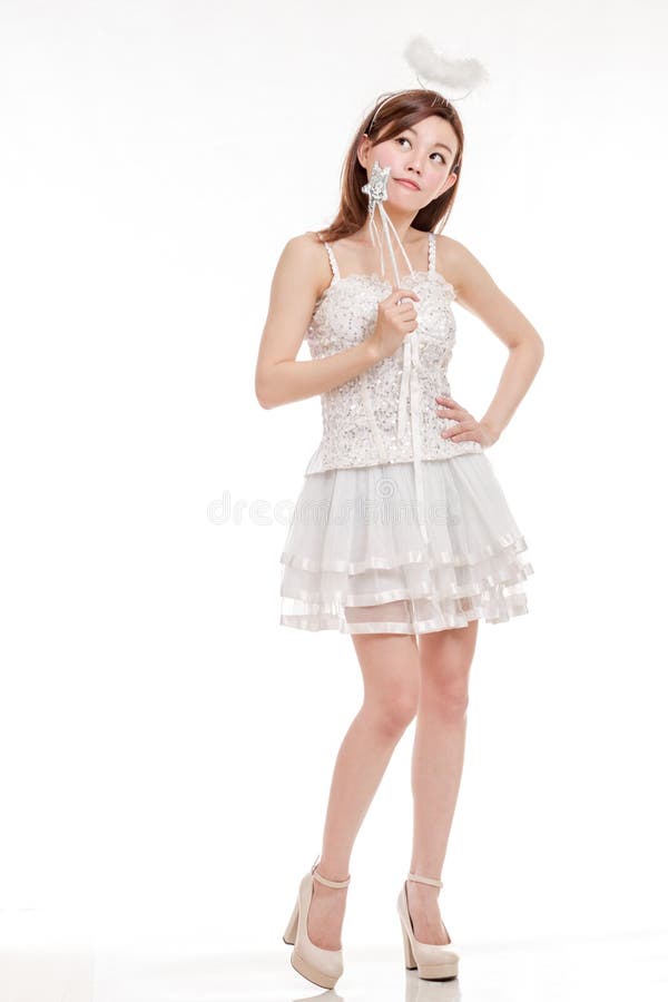 Belle femme asiatique en pensée d'Angel Costume photos libres de droits Belle femme asiatique en pensée d'Angel Costume photos libres de droits