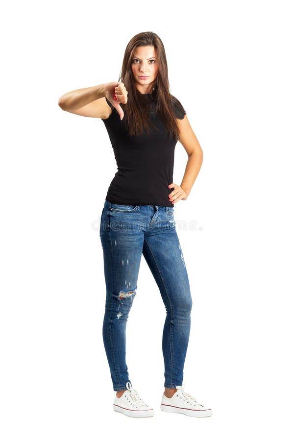 Belle femme avec le pouce vers le bas image stock Belle femme avec le pouce vers le bas image stock