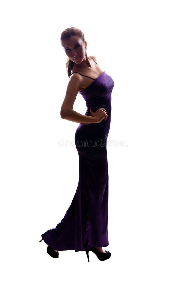 Belle fille mince dans la longue robe de soirée photographie stock Belle fille mince dans la longue robe de soirée photographie stock