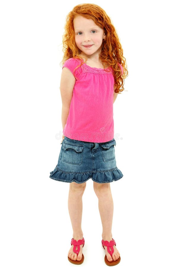 Belle fille rousse timide d'école au-dessus de blanc images libres de droits Belle fille rousse timide d'école au-dessus de blanc images libres de droits