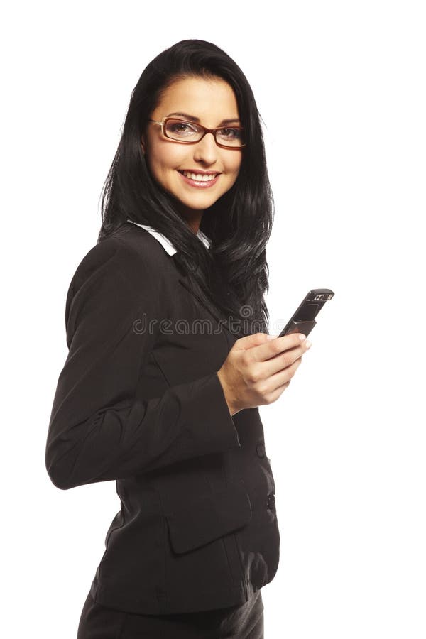 Belle jeune femme appelant par le mobile photos stock Belle jeune femme appelant par le mobile photos stock