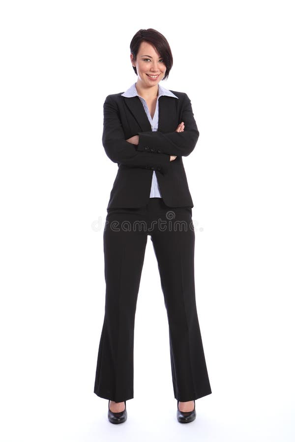 Belle jeune femme de sourire d'affaires dans le procès images stock Belle jeune femme de sourire d'affaires dans le procès images stock