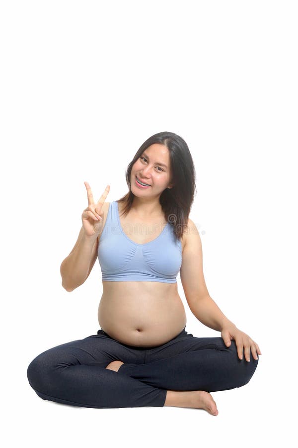 Belle jeune femme enceinte sportive photographie stock Belle jeune femme enceinte sportive photographie stock