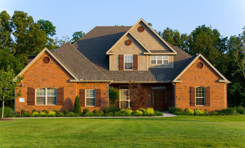 Beautiful house or property late in the afternoon against blue sky. Beautiful house or property late in the afternoon against blue sky