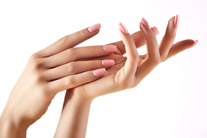 Belle mani del ` s della donna su fondo leggero Cura circa la mano Palma tenera Manicure naturale, pelle pulita Chiodi dentellare fotografia stock libera da diritti Belle mani del ` s della donna su fondo leggero Cura circa la mano Palma tenera Manicure naturale, pelle pulita Chiodi dentellare fotografia stock libera da diritti