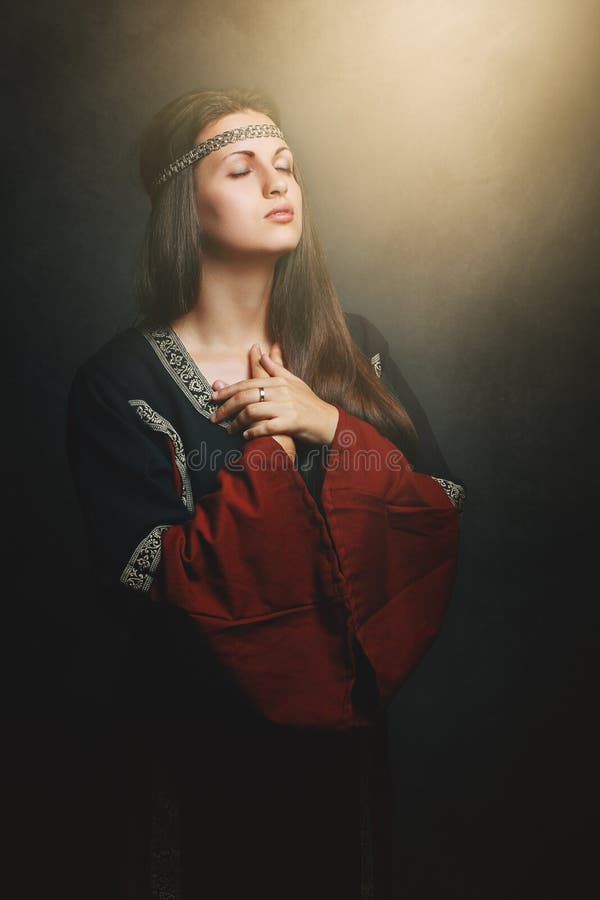 Belle prière médiévale de femme image libre de droits Belle prière médiévale de femme image libre de droits