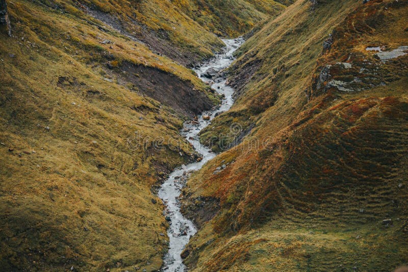 Beautiful landscape from the Grossglockner National Park Hohe Tauern, Austria. Alpine road in autumn and foggy weather. Beautiful landscape from the Grossglockner National Park Hohe Tauern, Austria. Alpine road in autumn and foggy weather