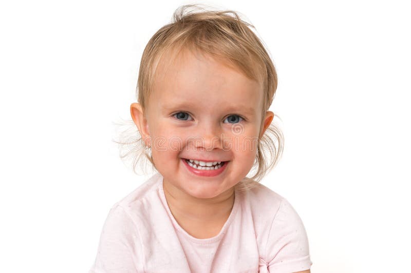 Bello bambino sorridente isolato su fondo bianco immagine stock Bello bambino sorridente isolato su fondo bianco immagine stock