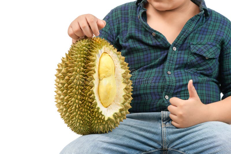 Belly fat boy holding durian isolated on white background royalty free stock photos