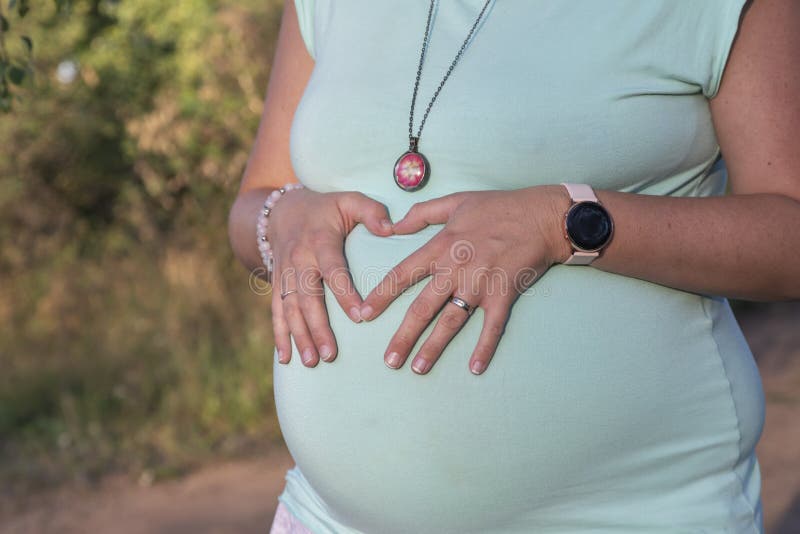 Belly Of A Pregnant Woman In The Eighth Month The Woman Has Her Hands belly-of-a-pregnant-woman-in-the-eighth-month-the-woman-has-her-hands