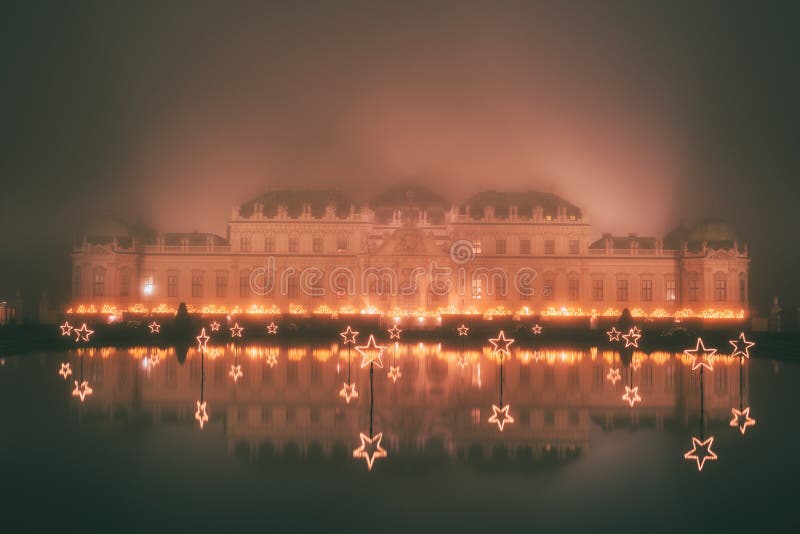 Belvedere Palace at misty night in Christmas lights stock photo Belvedere Palace at misty night in Christmas lights stock photo