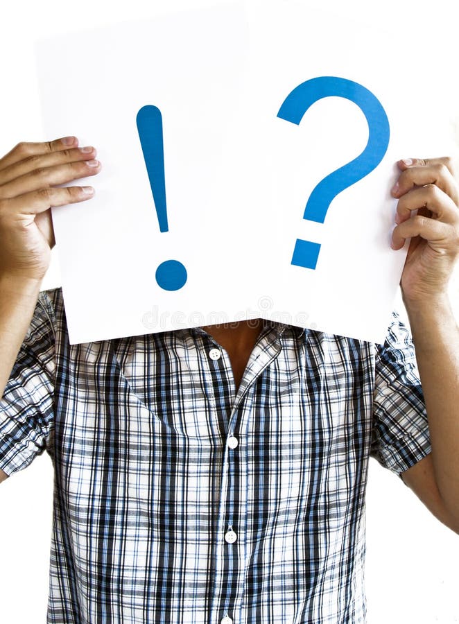 Man Holding a exclamation point and question mark in Front of face. White paper. Man Holding a exclamation point and question mark in Front of face. White paper.