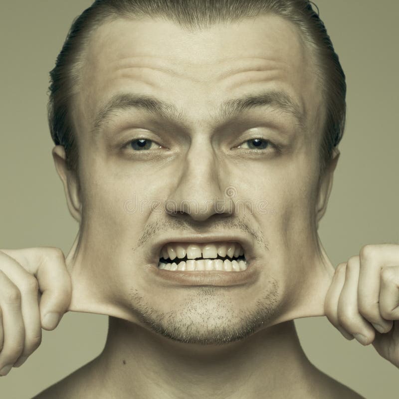 Bemannen Sie seine Backen heraus ausdehnen stockfoto Bemannen Sie seine Backen heraus ausdehnen stockfoto
