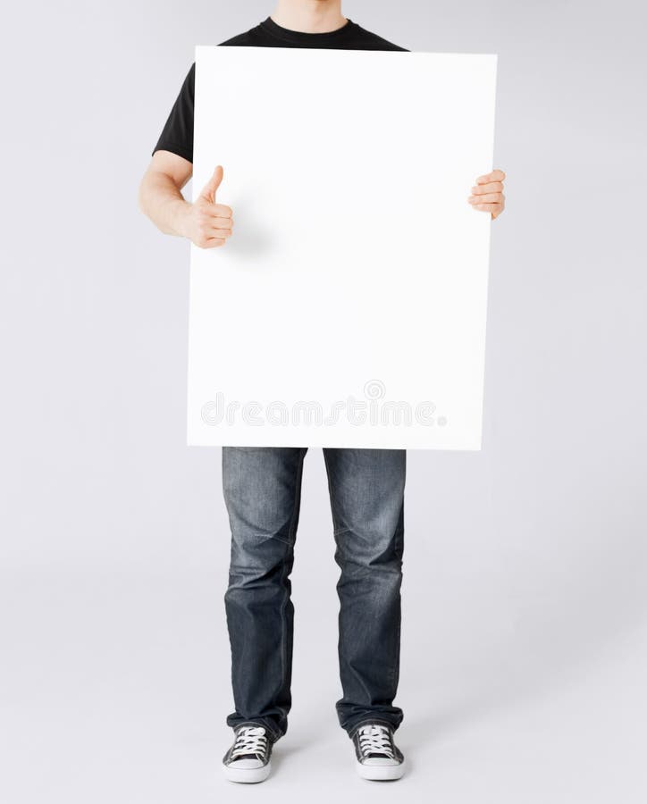 Bemannen Sie weißes leeres Brett und Daumen sich zeigen lizenzfreies stockfoto Bemannen Sie weißes leeres Brett und Daumen sich zeigen lizenzfreies stockfoto