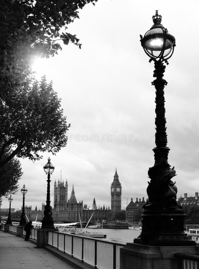 View from the south bank of river thames on the westminster palace and the world famous big ben in black and white. View from the south bank of river thames on the westminster palace and the world famous big ben in black and white