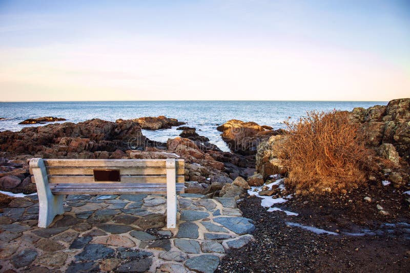 Bench on Marginal Way Path at Sunset in Ogunquit Maine during Winter