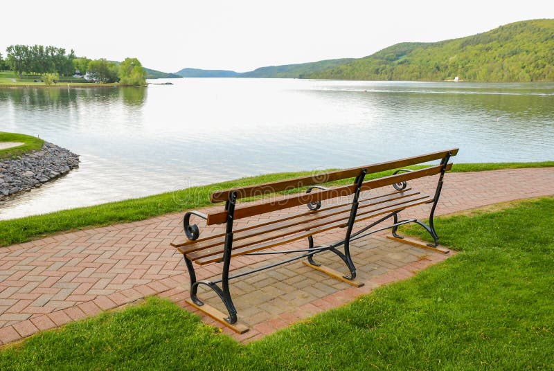 Bench Overlooking Lake stock photos Bench Overlooking Lake stock photos