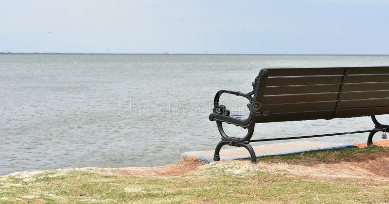 Bench, Wooden and Iron, overlooking Lake Hefner stock image Bench, Wooden and Iron, overlooking Lake Hefner stock image