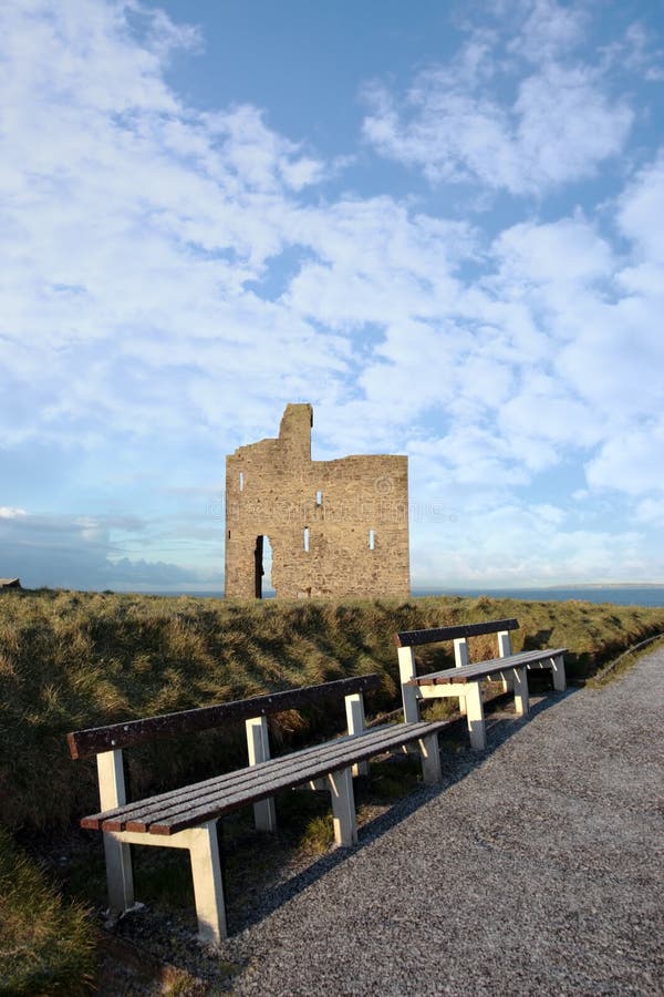 Benches and ballybunion castle ruin view