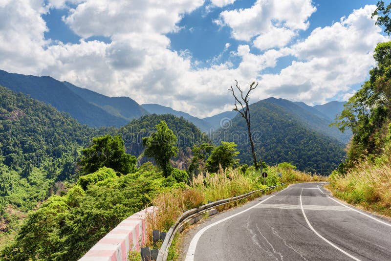 Bend of road and a beautiful view of the mountains around Da Lat