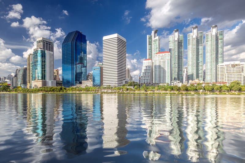 Cityscape of Tower, condomenium and bulding at benjakiti park with blue sky and river in Bangkok city, Thailand. Cityscape of Tower, condomenium and bulding at benjakiti park with blue sky and river in Bangkok city, Thailand