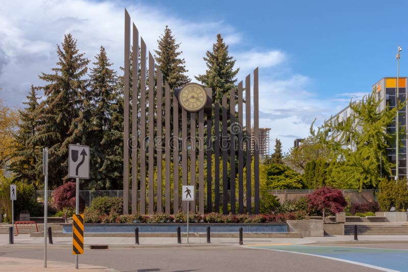 Kelowna, BC, Canada - July 13, 2020: Bennett Clocktower at Queensway Exchange in Kelowna, BC, Canada. Kelowna, BC, Canada - July 13, 2020: Bennett Clocktower at Queensway Exchange in Kelowna, BC, Canada