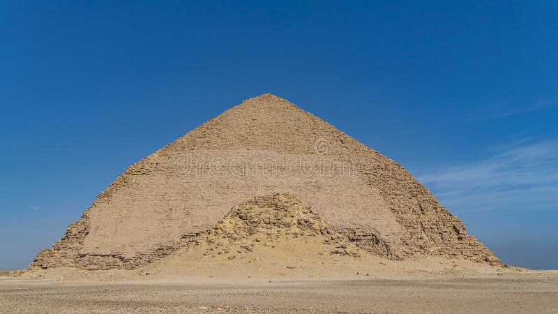 The Bent Pyramid is an ancient Egyptian pyramid located at the royal necropolis of Dahshur, approximately 40 kilometres south of stock photos