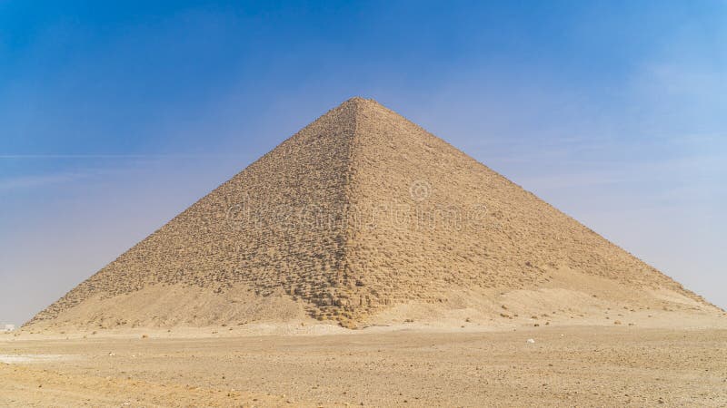 The Bent Pyramid is an ancient Egyptian pyramid located at the royal necropolis of Dahshur, approximately 40 kilometres south of stock image