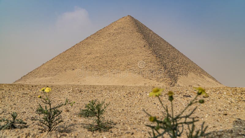 The Bent Pyramid is an ancient Egyptian pyramid located at the royal necropolis of Dahshur, approximately 40 kilometres south of royalty free stock photography