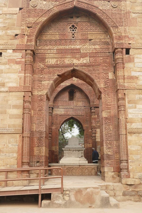 Elaborate carvings at ruins of the Tomb of slave dynasty sultan Iltutmish from 13th century, Qutb Minar complex, Delhi, India. Elaborate carvings at ruins of the Tomb of slave dynasty sultan Iltutmish from 13th century, Qutb Minar complex, Delhi, India