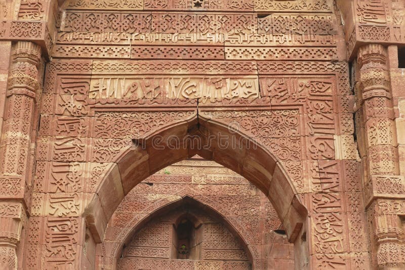 Elaborate carvings at ruins of the Tomb of slave dynasty sultan Iltutmish from 13th century, Qutb Minar complex, Delhi, India. Elaborate carvings at ruins of the Tomb of slave dynasty sultan Iltutmish from 13th century, Qutb Minar complex, Delhi, India