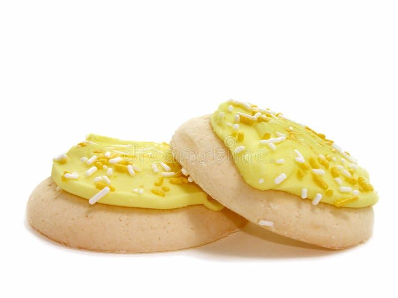 Bereifte u. gespritzte Zuckerplätzchen der Zitrone-zwei lizenzfreie stockbilder Bereifte u. gespritzte Zuckerplätzchen der Zitrone-zwei lizenzfreie stockbilder
