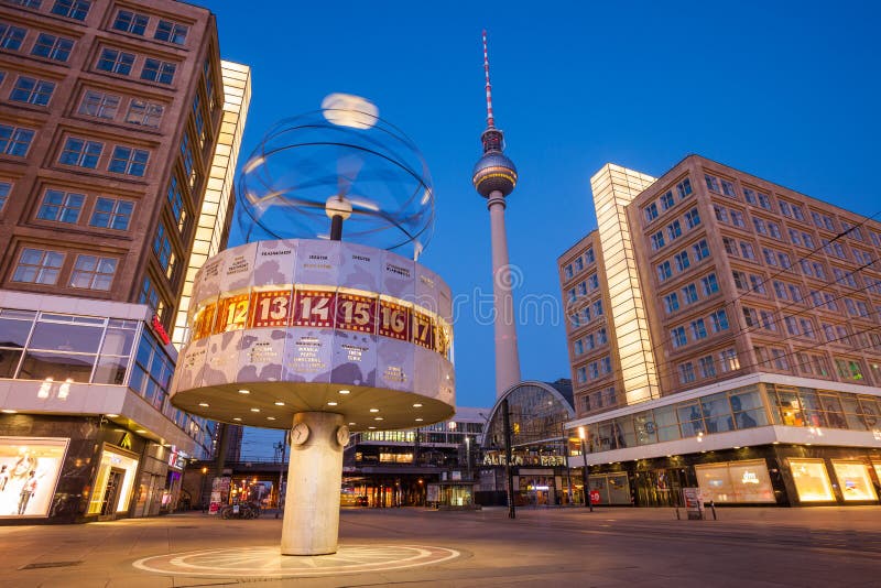 Speeding Tram at Berlin Alexanderplatz and World Clock Editorial Stock