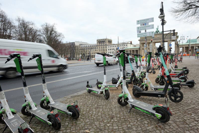 Motorized Electric Scooters at Brandenburg Gate in Berlin, Germany in