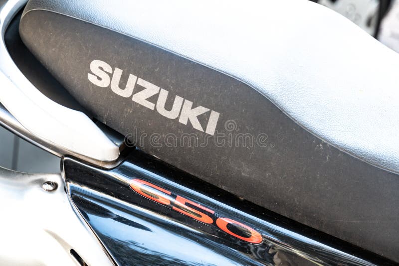 Berlin, Germany - April 18, 2019: Emblem of Suzuki SV650, a street motorcycle manufactured for the international market by the Suzuki Motor Corporation featuring a mid-sized V-twin engine. Berlin, Germany - April 18, 2019: Emblem of Suzuki SV650, a street motorcycle manufactured for the international market by the Suzuki Motor Corporation featuring a mid-sized V-twin engine